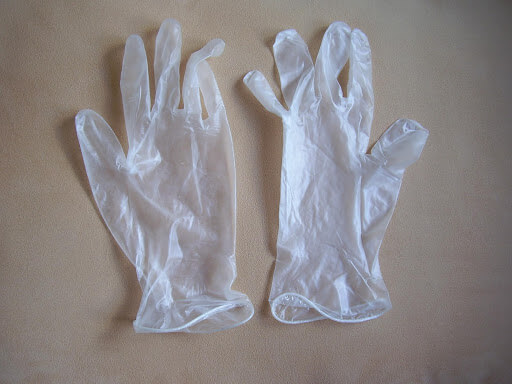 Wear Disposable Plastic Gloves